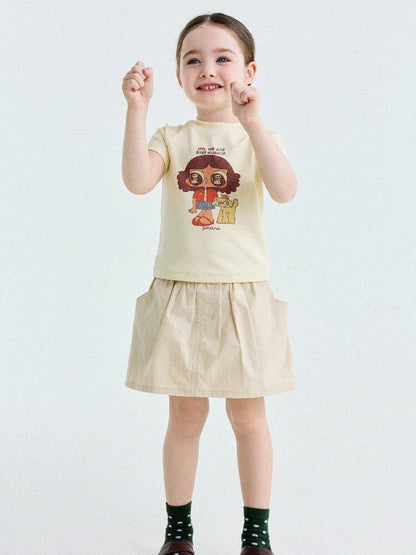 子ども用ラグランTシャツ　淡いイエロー地にキャラクタープリント