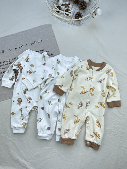 長袖プリントのベビー用ロンパース2点（ホワイト地の動物・クロワッサン柄、ブラウン袖口）
