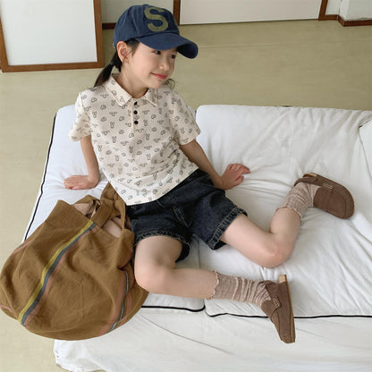 ベージュのうさぎ柄鹿の子コットン半袖ポロシャツ