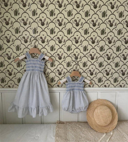 Smocked Ruffle Hem Dress ノースリーブワンピース【mh0013208】
