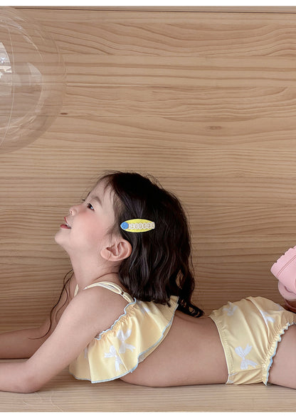 子ども用 イエロー フリルビキニのアップ（ブラと肩ひも）