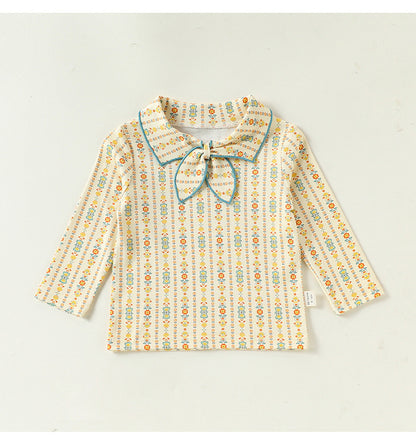 襟付きリボンタイ付き長袖Tシャツ（薄黄色系・小柄プリント）