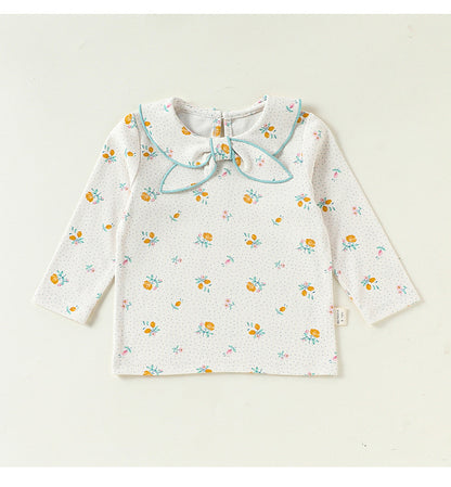 白地のベビー長袖Tシャツ、丸襟リボン付き花柄