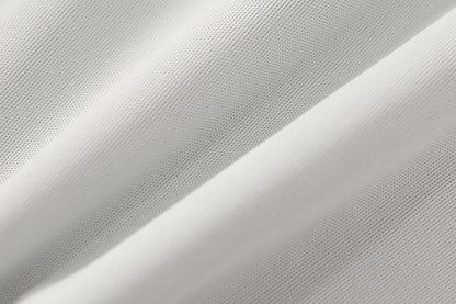 防水長袖お食事エプロンの白い生地アップ