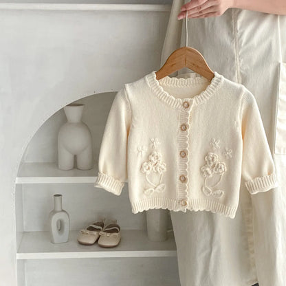 カーディガン・パーカー ベビーカーディガン ニットジャケット フラワーアップリケ アプリコットホワイト