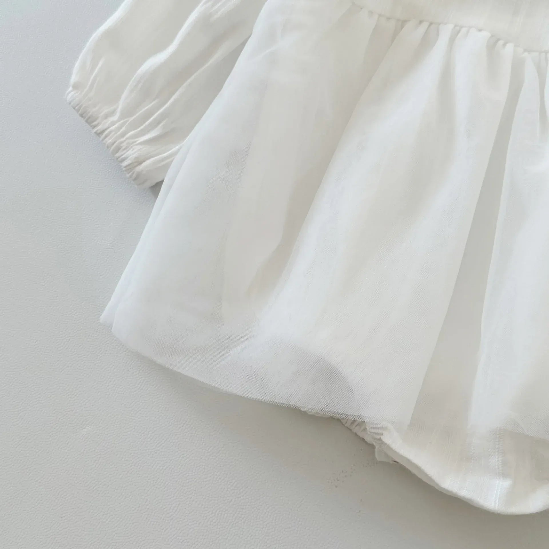 長袖ロンパース ベビーロンパース 長袖スカートボディスーツ レース スワンワンポイント ホワイト