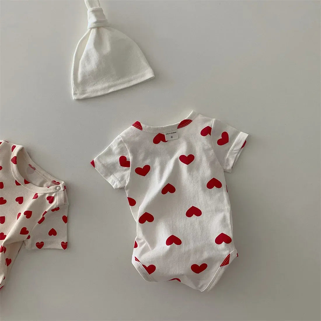 半袖ロンパース ベビーロンパース 半袖ボディスーツ ハートプリント