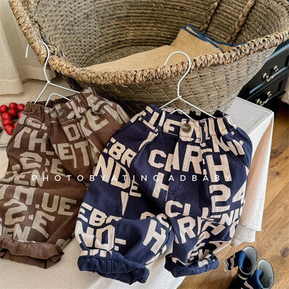 ロングパンツ・スウェットパンツ キッズパンツ ルーズロングワイドパンツ ブロックレターロゴプリント 2カラー