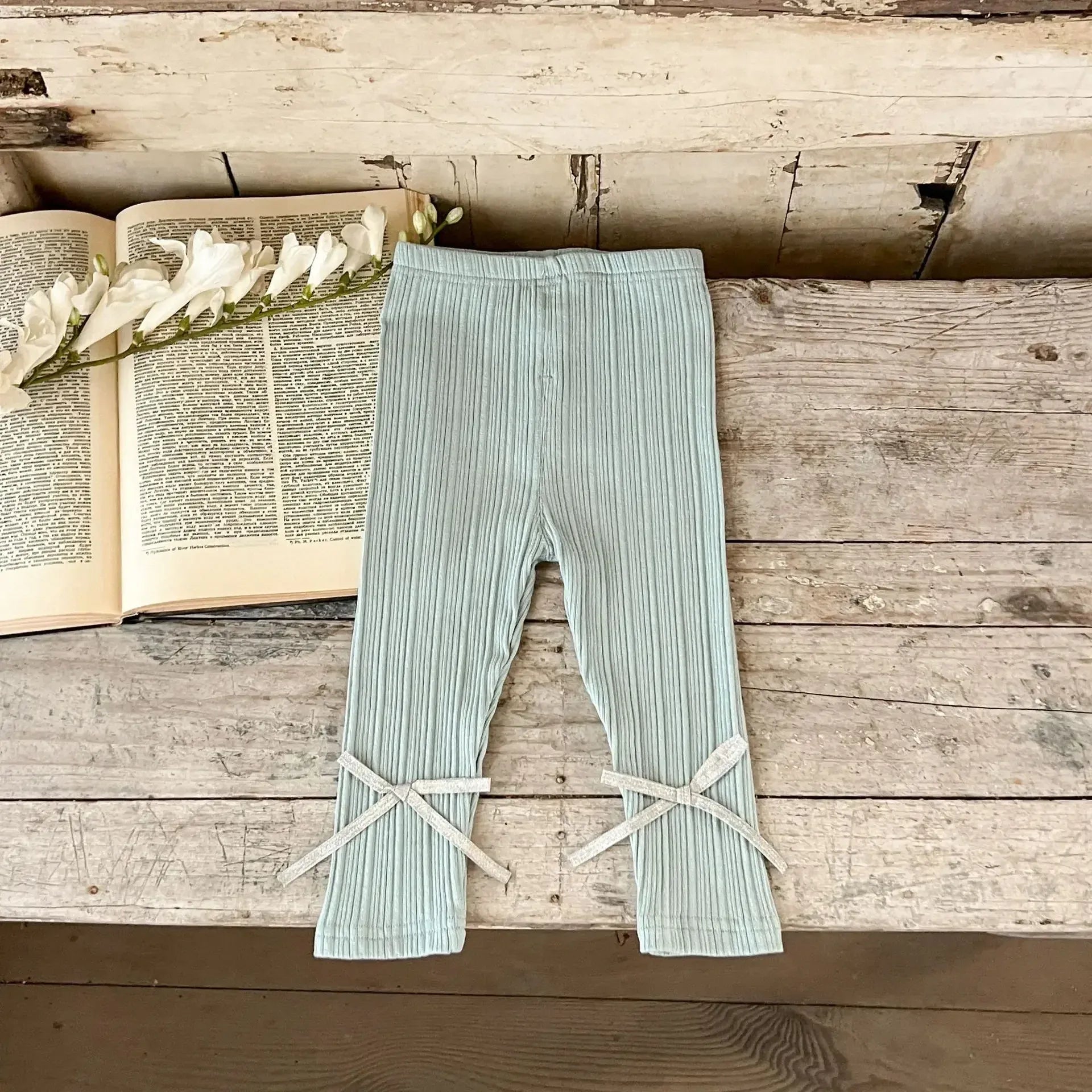 長袖セットアップ ベビーセットアップ 2点セット 裾チュールフリルペプラム長袖Tシャツ+リボンレギンスパンツ 2カラー【mh0007105】