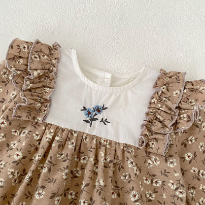 ベビー長袖ロンパース 白い胸元に青い花刺繍とカーキの花柄プリント