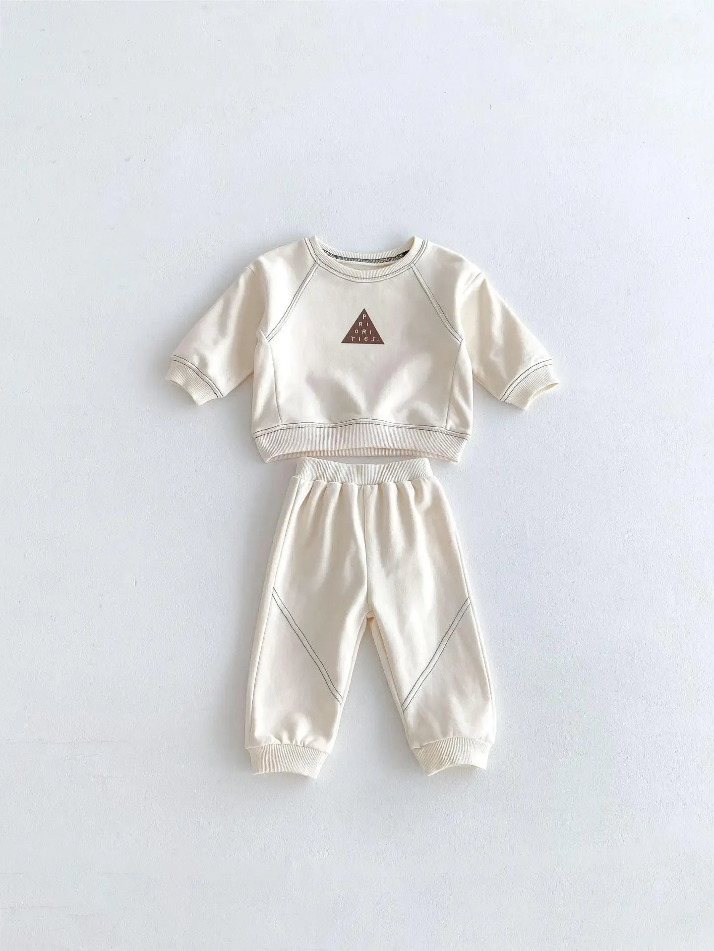 長袖セットアップ Apricot / 9M  73CM ベビーキッズセットアップ 2点セット 長袖スウェットシャツ+スウェットパンツ ラグラン切り替え ワンポイントプリント 2カラー【mh0006368】