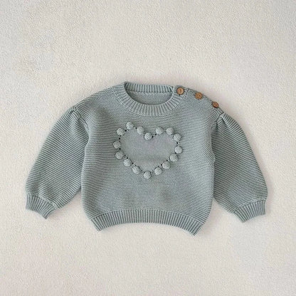 ベビー用水色長袖ニット、ハート刺繍モチーフの前面