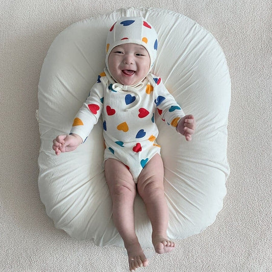 長袖ロンパース Ivory / 66cm 【国内発送・送料無料】ベビーロンパース 長袖ボディスーツ カラフルハートプリント 66サイズ