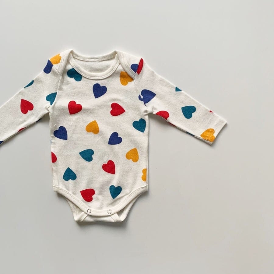長袖ロンパース Ivory / 66cm 【国内発送・送料無料】ベビーロンパース 長袖ボディスーツ カラフルハートプリント 66サイズ