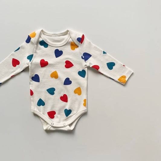 長袖ロンパース Ivory / 66cm 【国内発送・送料無料】ベビーロンパース 長袖ボディスーツ カラフルハートプリント 66サイズ