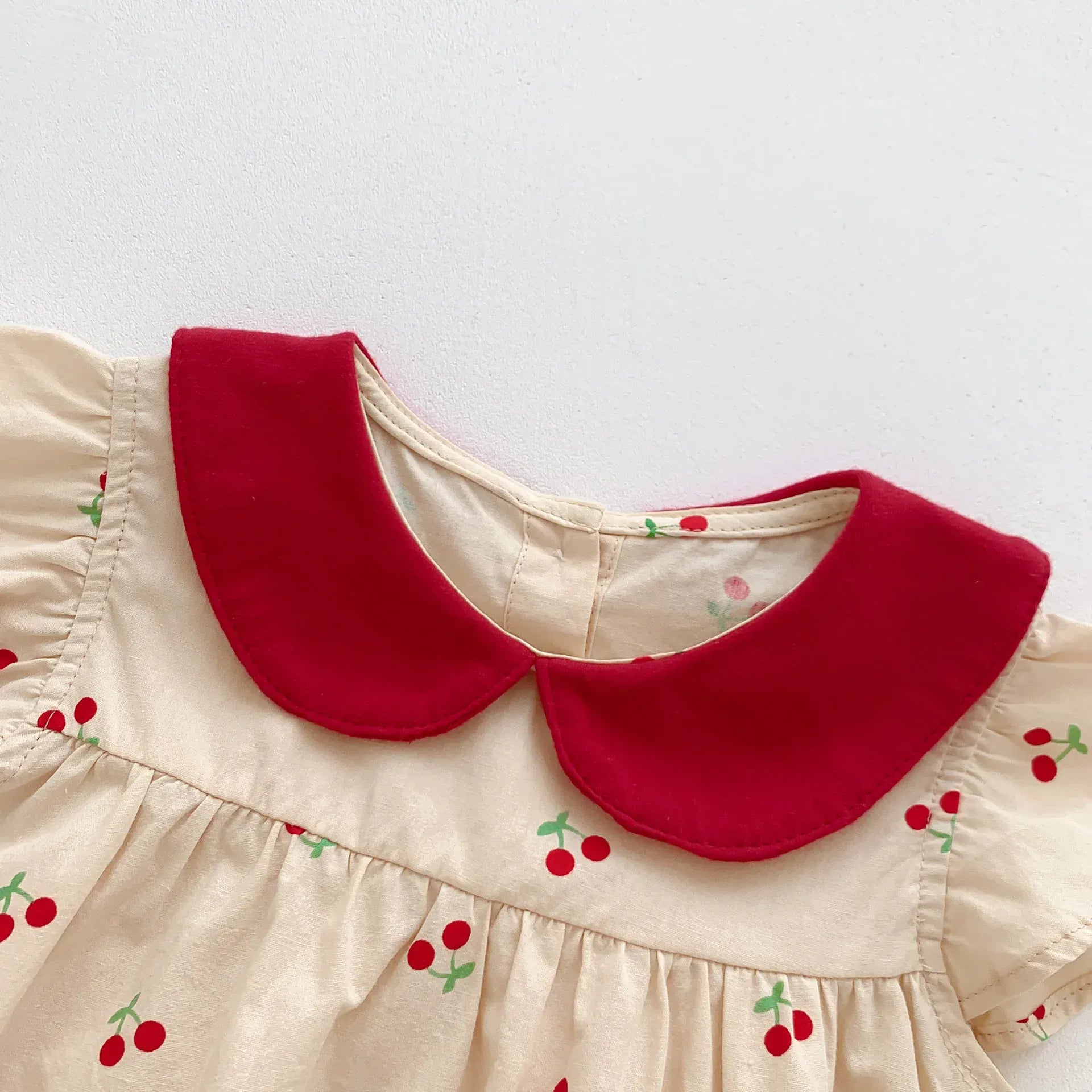 半袖ロンパース ベビーロンパース フリルスリーブボディスーツ チェリーさくらんぼプリント アプリコット【mh0005205】