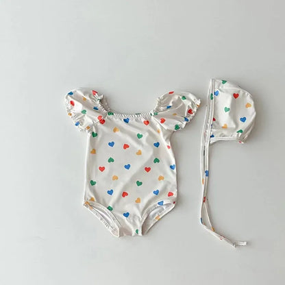 ベビー用水着 White / 66cm ベビー水着 ワンピース 半袖パフスリーブ スイムウェア 水玉ドット チェック カラフルハート 帽子セット 3カラー【mh0004920】
