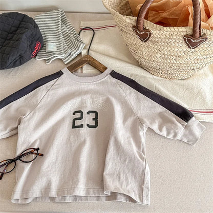 長袖Tシャツ apricot / 80cm キッズトップス 長袖Tシャツ パッチワーク ラグランスリーブ アプリコット/ピンク/2カラー