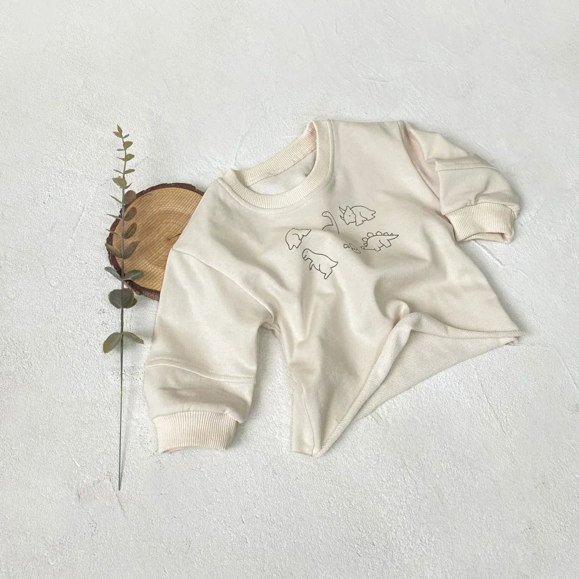 長袖Tシャツ beige / 9M  73cm / 取り寄せ（7〜30日） ベビートップス ダイナソー恐竜プリント長袖スウェットTシャツ 2カラー