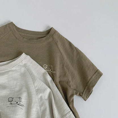 キッズ半袖ラグランTシャツ 茶系と白、胸のワンポイントプリント