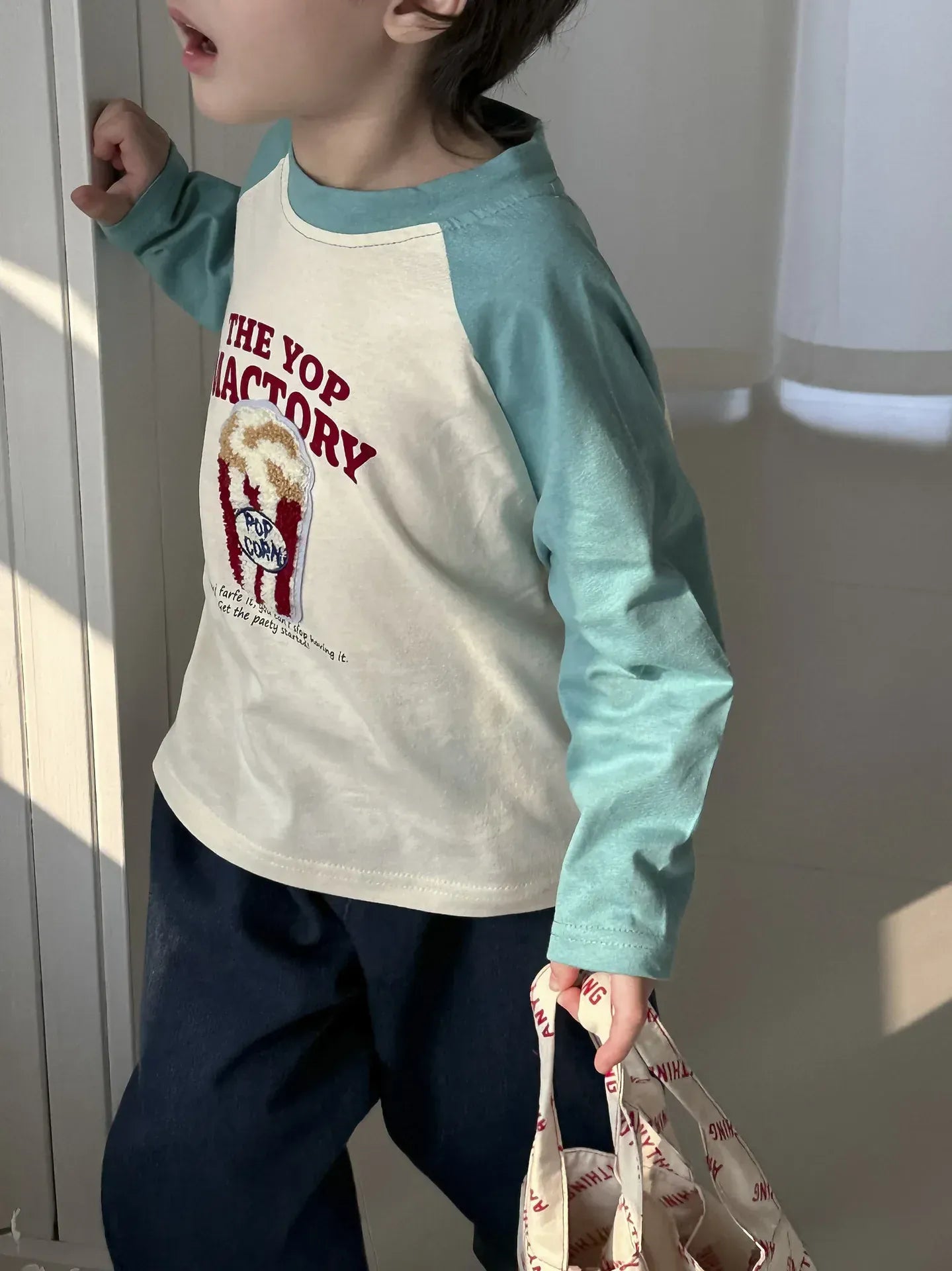 長袖Tシャツ キッズトップス 長袖Tシャツ ロンT ラグランパッチワーク ポップコーンケーキバナナ刺繍 4カラー