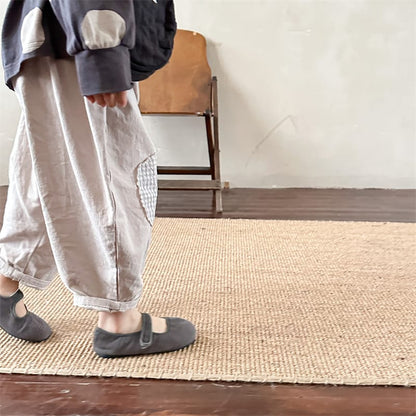 キッズ用ルーズパンツ 白系 ひざのチェックパッチとゆとりのある形