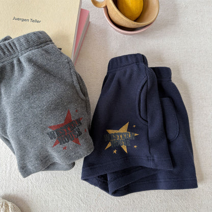 キッズ用ショートパンツ2色（グレー/ネイビー）、星プリントのルーズシルエット
