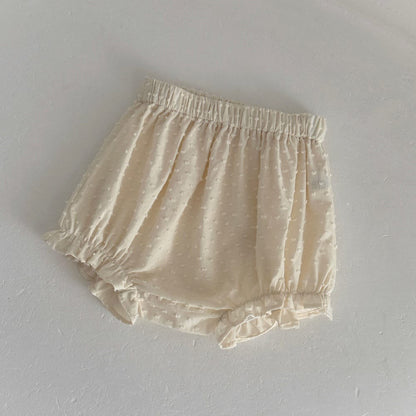 ベビー用ショートパンツ、細かなドット柄のフリル裾とゴムウエスト