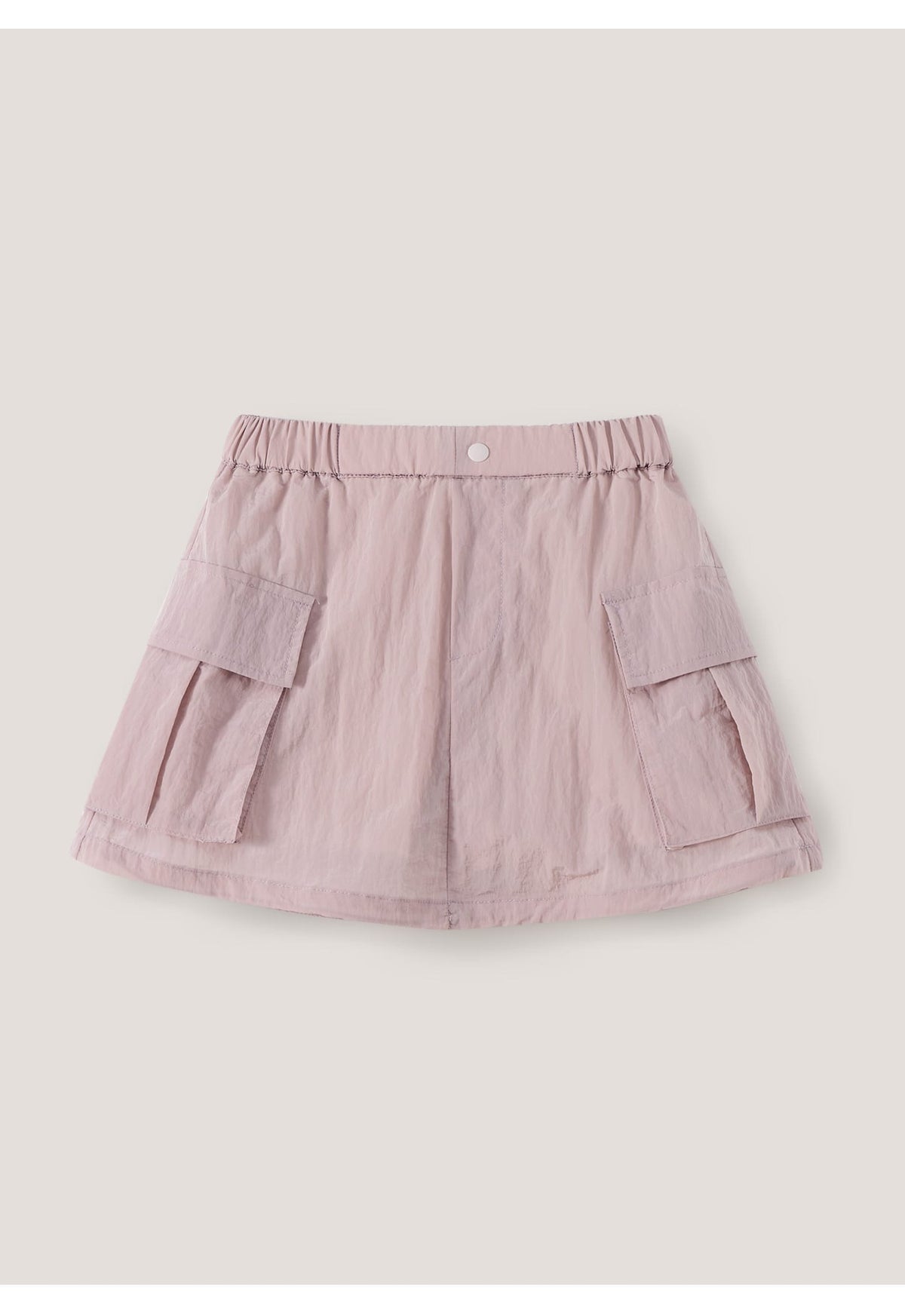 ピンクのキッズミニスカート、パッチポケットとウエストゴム