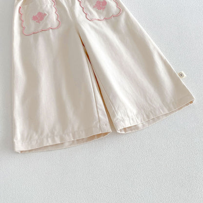 キッズ用サロペットパンツ 台形シルエット サイドの刺繍モチーフ