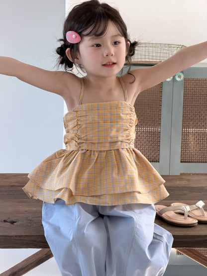 イエローチェック柄シャーリングキャミソール、ペプラムが広がるデザイン