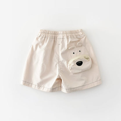 ベージュのアニマルポケット付きコットンショートパンツ、フロントは無地風