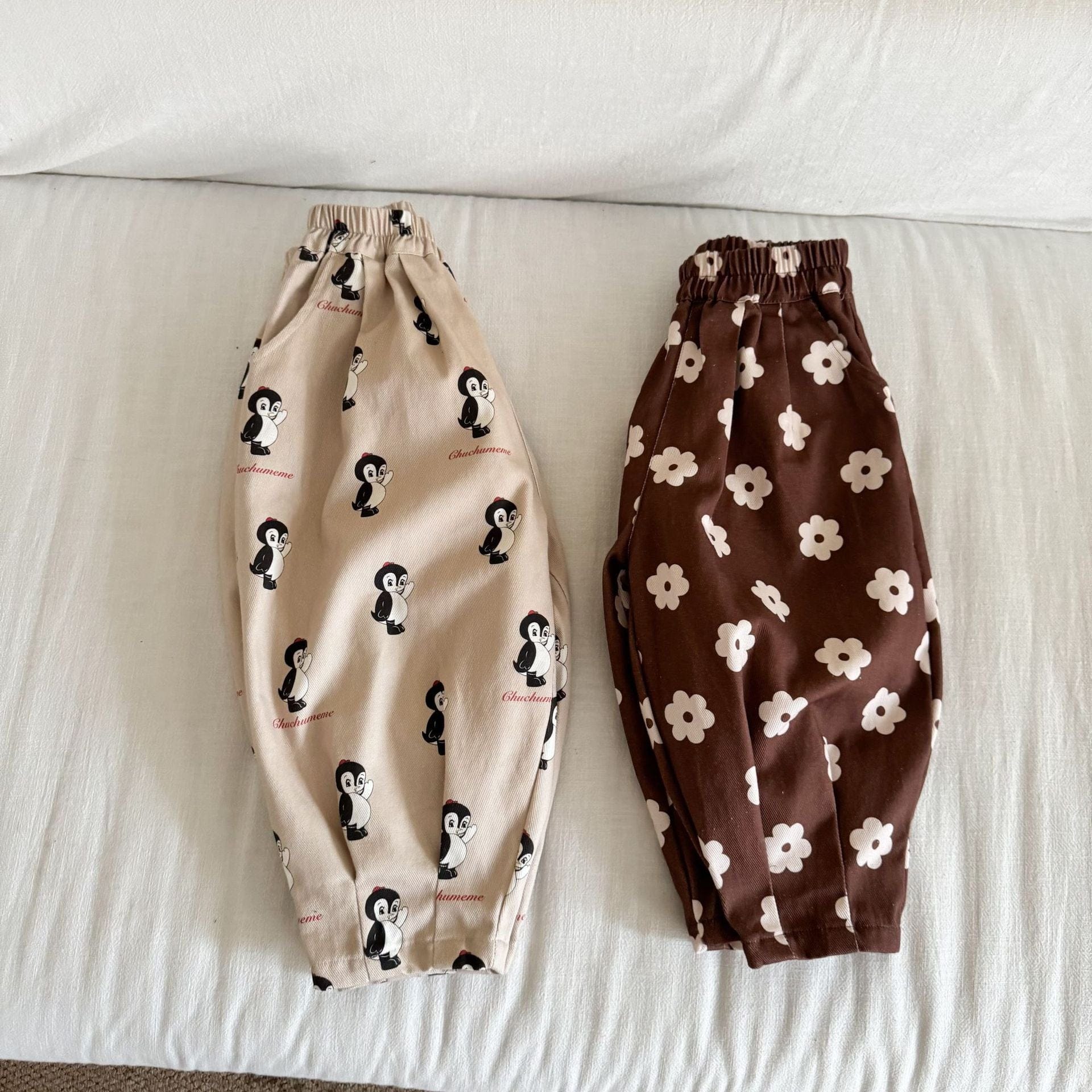 ロングパンツ・スウェットパンツ ペンギン/フラワープリントロングルーズタックパンツ【mh0010496】