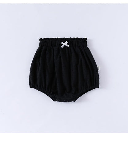 子ども用黒ブルマ：ドロワーズ風シルエット、前の白リボンとゴムウエスト