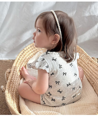 Ruffle Sleeve Eyelet Ribbed Romper リボン ラッフルスリーブロンパース【mh0013598】 Beitaoya 半袖ロンパース
