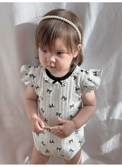 Ruffle Sleeve Eyelet Ribbed Romper リボン ラッフルスリーブロンパース【mh0013598】 Beitaoya 半袖ロンパース