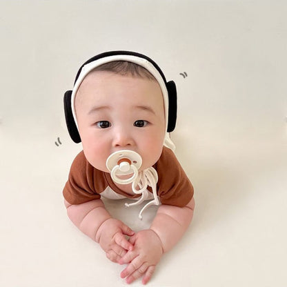 ヘッドホン風フード付き半袖ロンパース。レコード柄、ブラウンの袖・身頃。