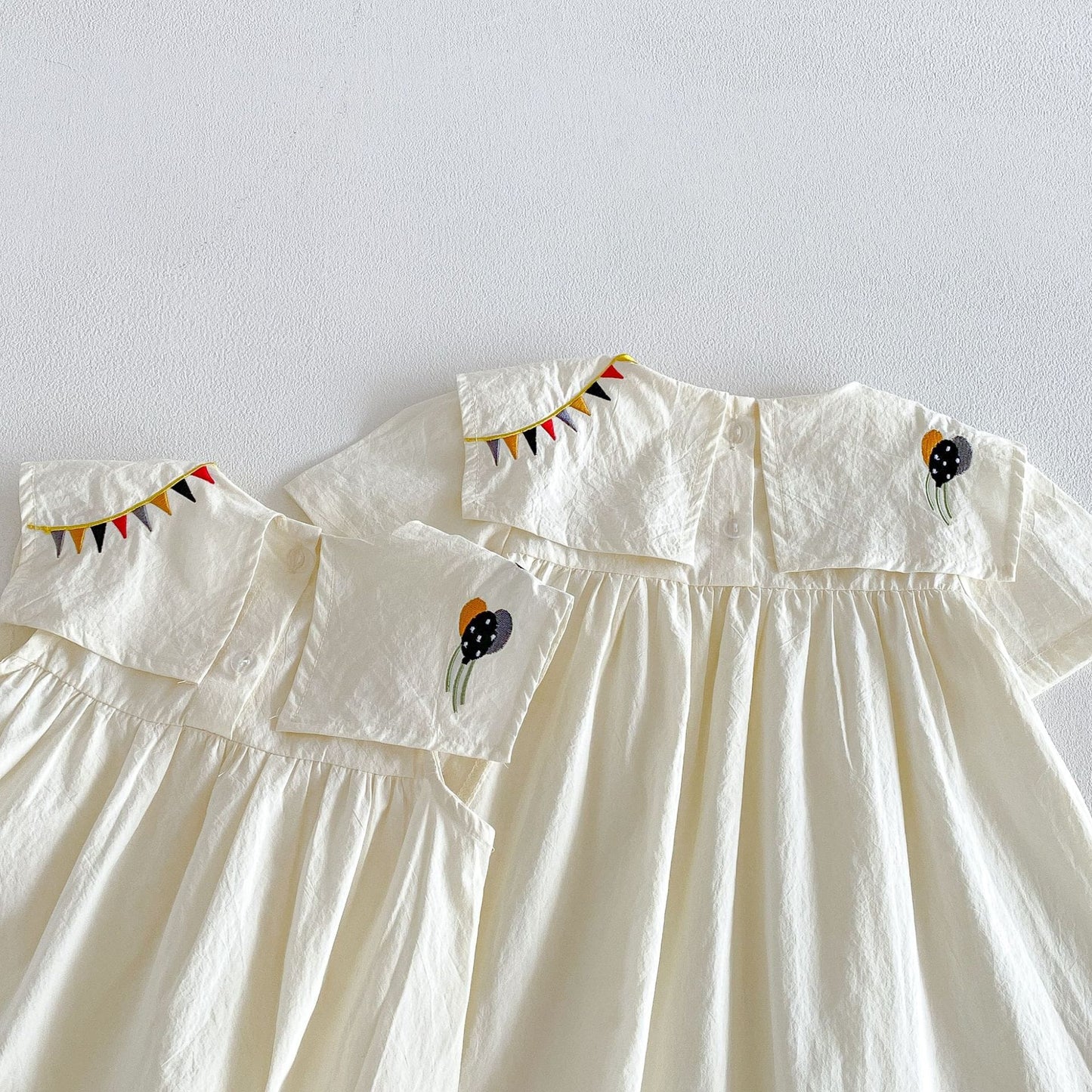 Sleeveless Ruffle Dress サーカス刺繍 ノースリーブロンパース 半袖ワンピース【mh0013430】 angou ノースリーブロンパース