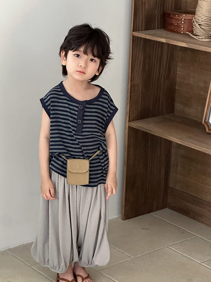 ベージュのバルーンロングパンツ ウエストゴムで広がるシルエット