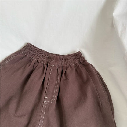 コーヒー色のハーフパンツ、フロント縦ステッチとギャザー入りウエスト
