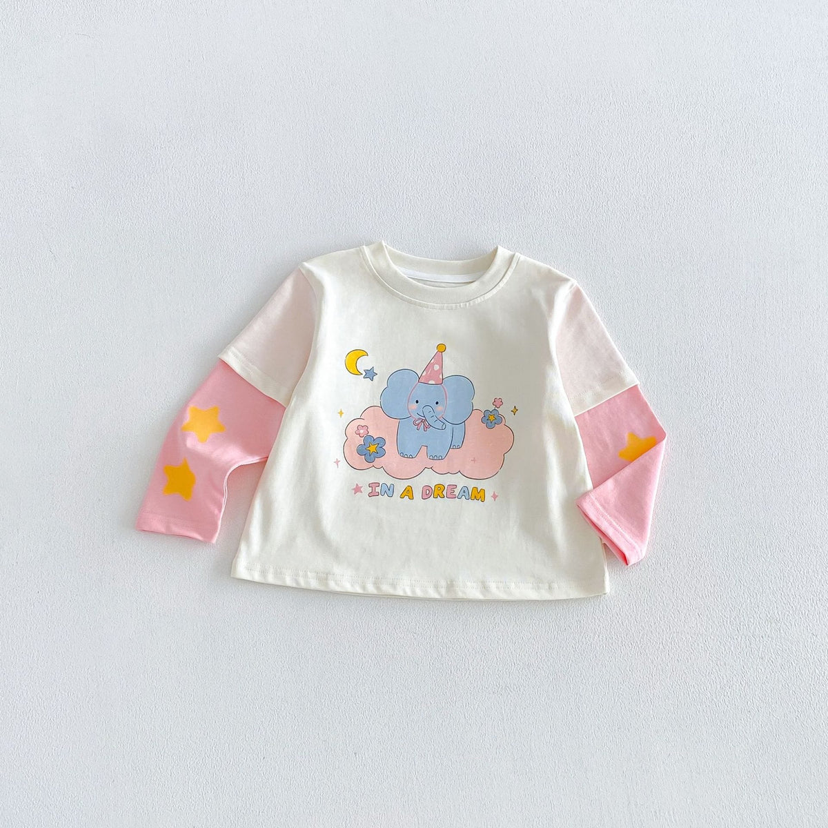 キッズ用長袖Tシャツ ホワイト×ピンク 袖の星柄とゾウのキャラクタープリント