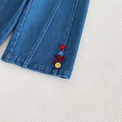 キッズ デニムパンツ 裾アップ カラフル刺繍とボタンの装飾
