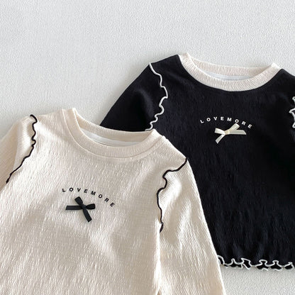 キッズ長袖Tシャツ2枚セット、黒とベージュにロゴと黒リボン、メローフリル