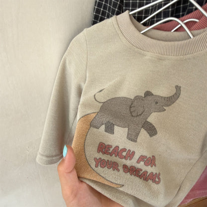 キッズ用長袖Tシャツ クリーム色 ゾウプリントと英字ロゴ入り
