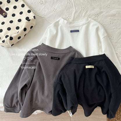 キッズ用ルーズ長袖Tシャツ、白・黒・グレーの3色セット風、胸のタグ付き