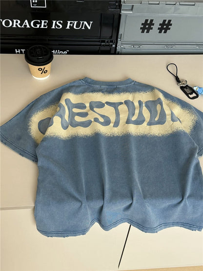 青いタイダイ柄の半袖Tシャツ、背面大きな英字プリント