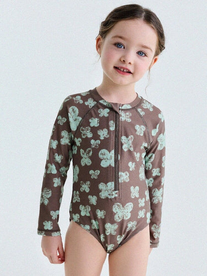子ども用ラッシュガード風ワンピース水着（長袖）ブラウン、花柄プリントの正面