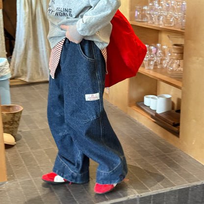 濃紺デニムのワイドパンツ、ビッグカフ仕様とフロントポケット、ラベル付き