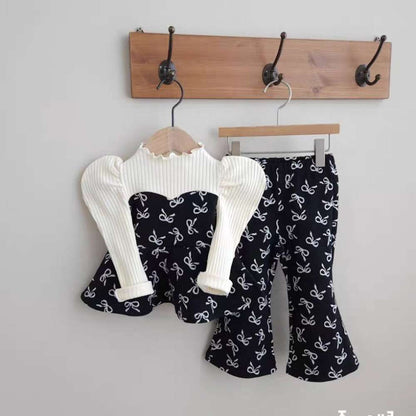 長袖セットアップ Black / 73cm リボン柄ペプラムトップス + フレアパンツ | パフ袖セットアップ | リンクコーデ【mh0011489】