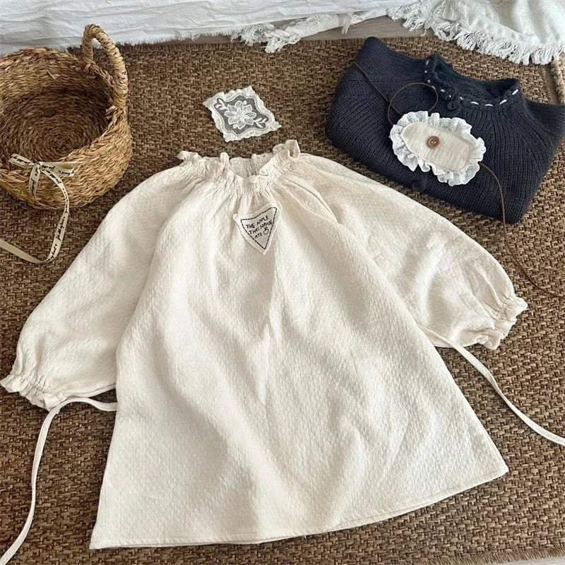 長袖ワンピース Beige / 18M (80) / 取り寄せ（7〜30日） キッズワンピース ワンポイント三角タグフリルカラー長袖スモッグワンピース ベージュ【mh0006753】